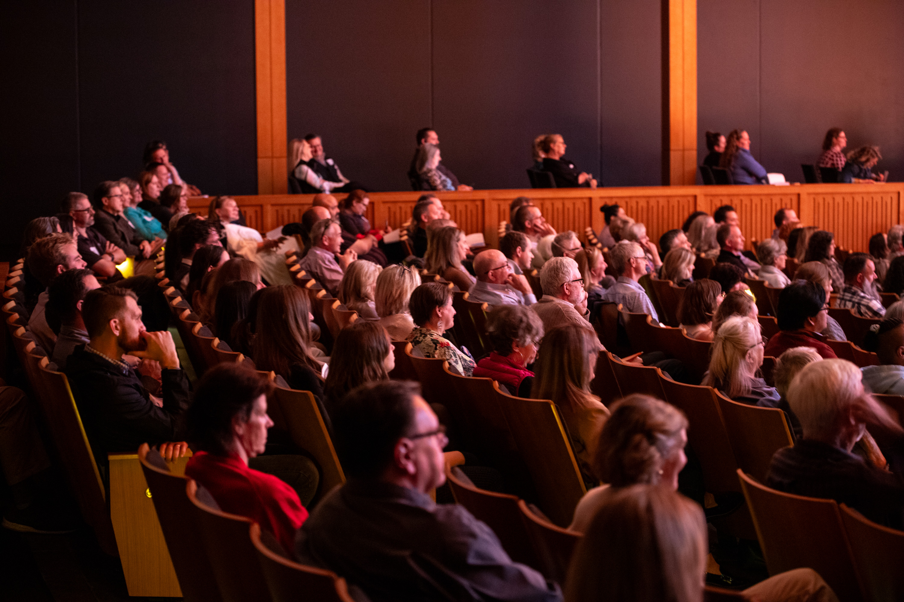 TEDX crowd listening to speakers.